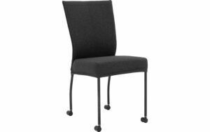 Afbeelding van een Goossens Eetkamerstoel Funk Zwarte Poten antraciet stof leuning en met wielen, modern design