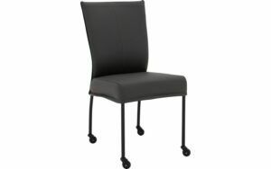Afbeelding van een Goossens Eetkamerstoel Funk Zwarte Poten donkergrijs leer leuning en Zwart skater wiel met zwarte kapmet wielen, modern design