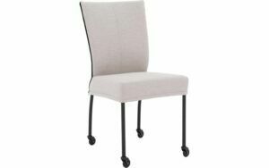 Afbeelding van een Goossens Eetkamerstoel Funk Zwarte Poten lichtgrijs stof leuning en met wielenZwart skater wiel met zwarte kap, modern design