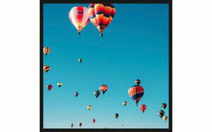 Afbeelding van een Goossens Schilderij Summer Time Balloon, 74 x 74 cm